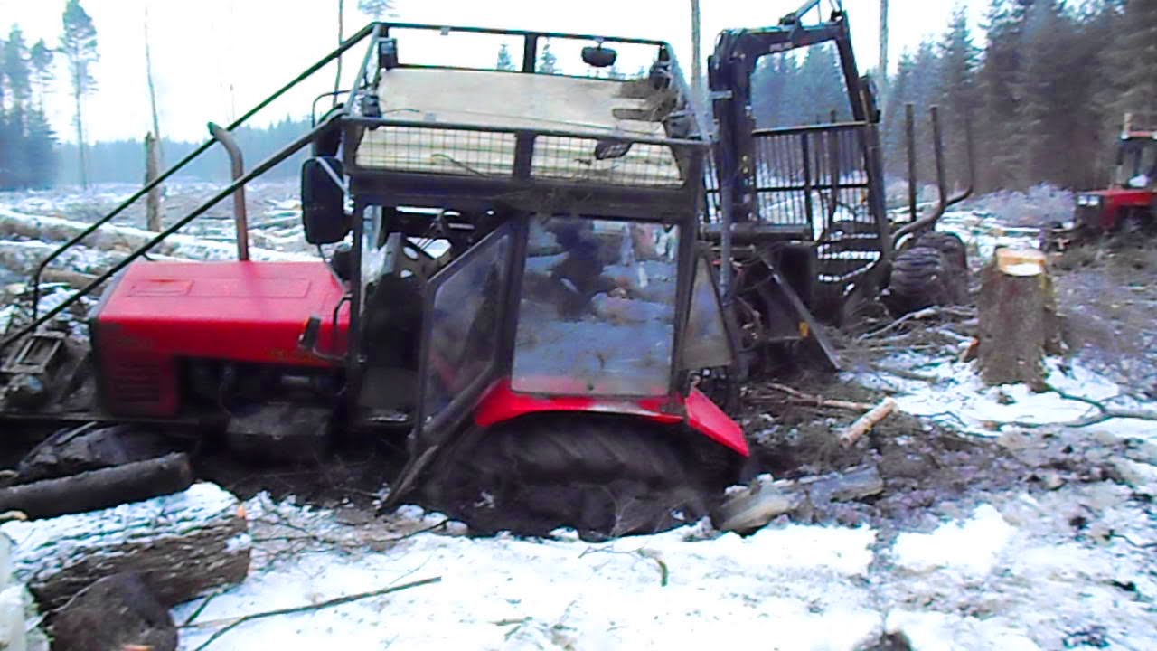 Belarus Mtz 892 forestry tractor  stuck in mud, saving with Mtz 1025