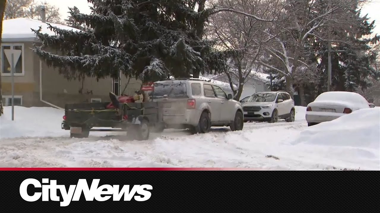 Edmonton residential roads jammed with snow