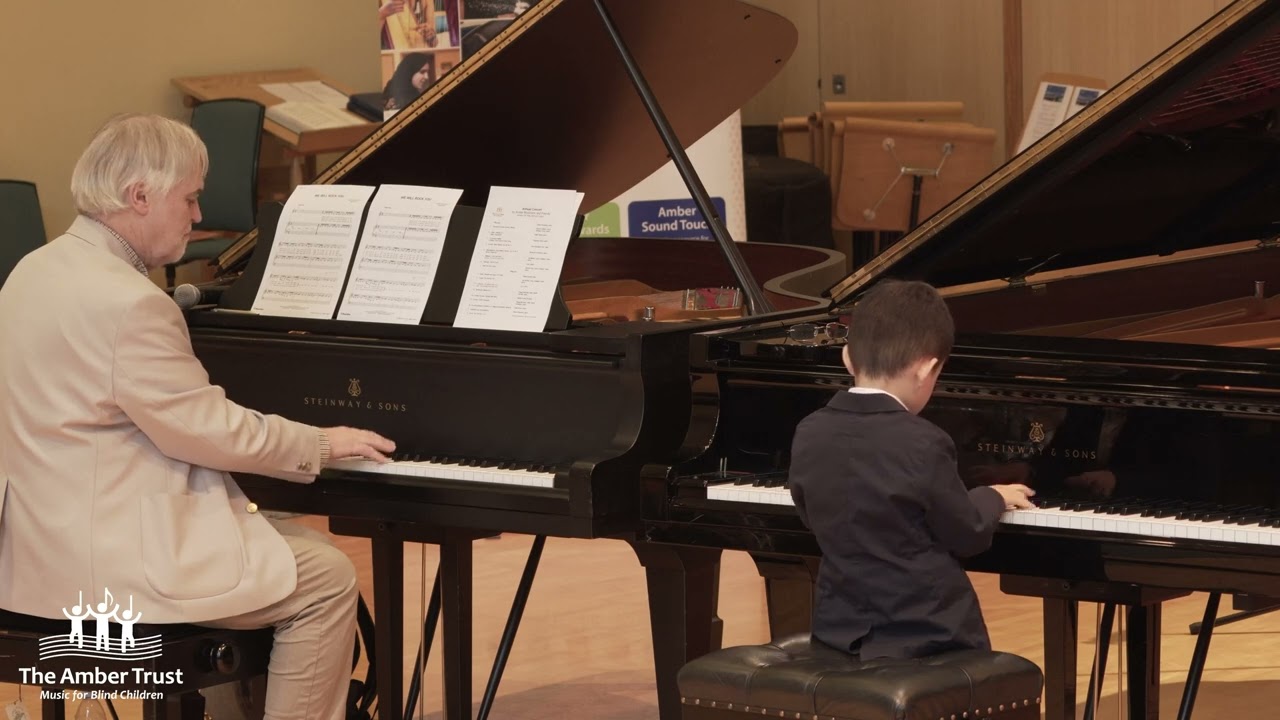 Evan, aged 6, performs Chopsticks