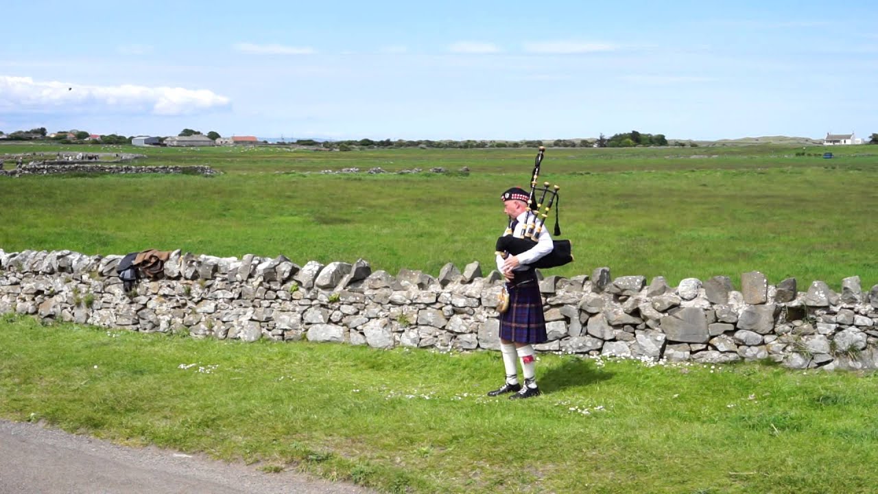 Skirl Of The Bagpipes At The Holy Island Of Lindisfarne