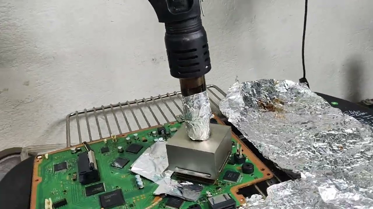 PS3 super slim de efeito na rsx reballing na churrasqueira elétrica