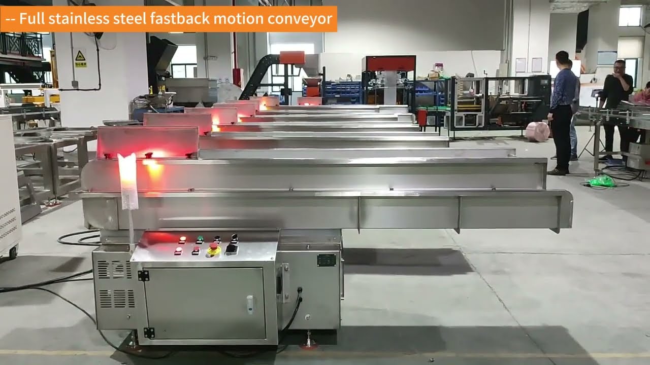 Full stainless steel fastback motion conveyor #fastback #conveyors