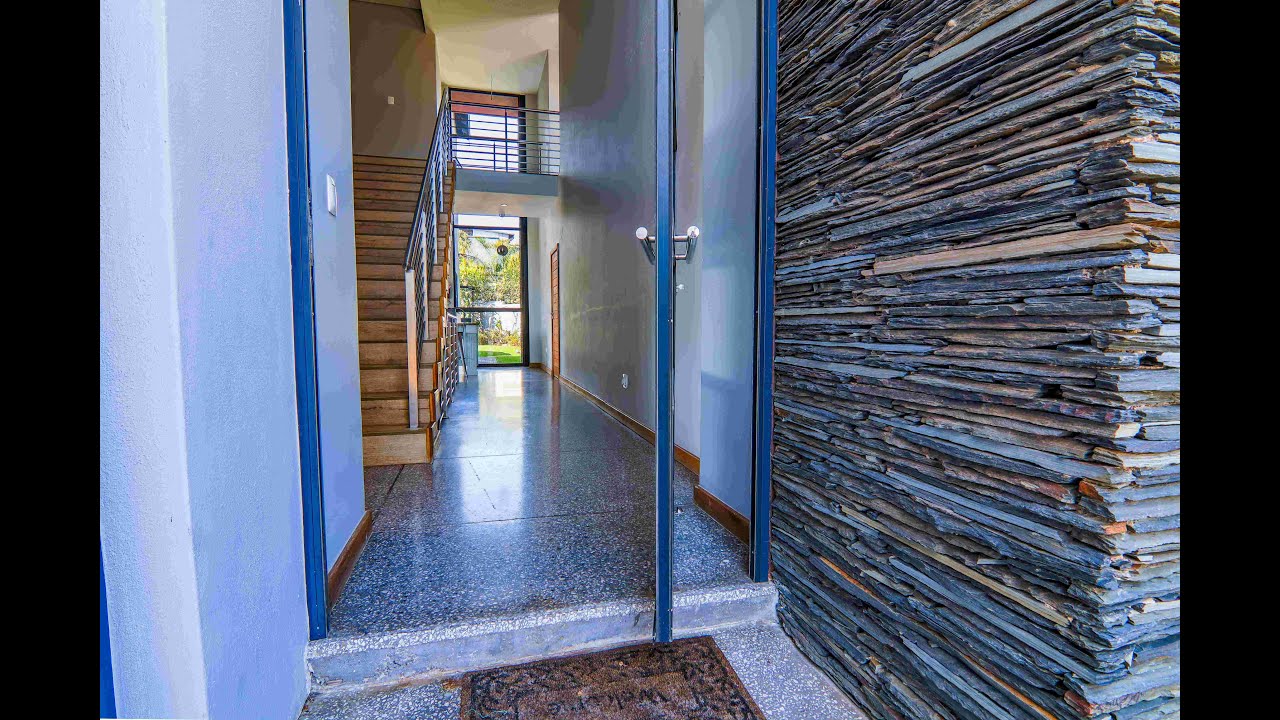 Elegant Golf Estate Living | 5-Bedroom Home with Views, Pool & Solar Power