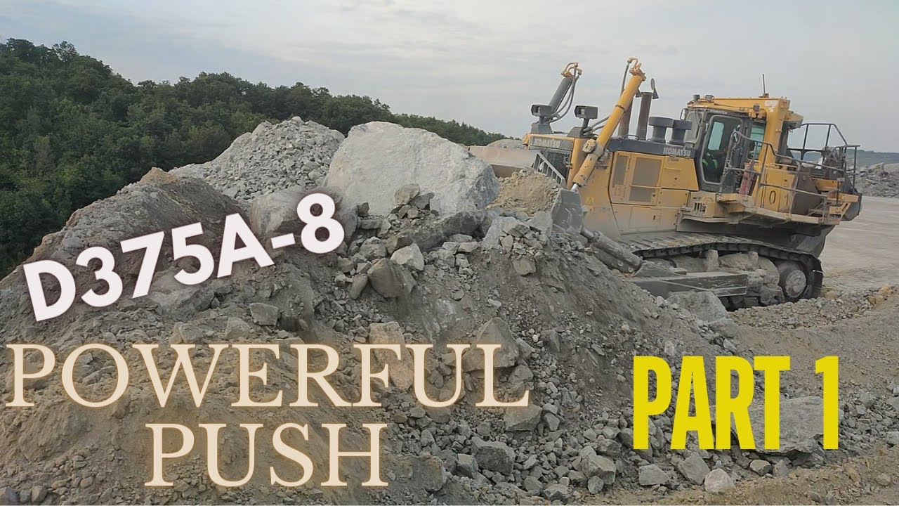 Powerful Komatsu D375A-8 Bulldozer Pushing Large Mterial Over Safety Bank Amzing Machines at Work