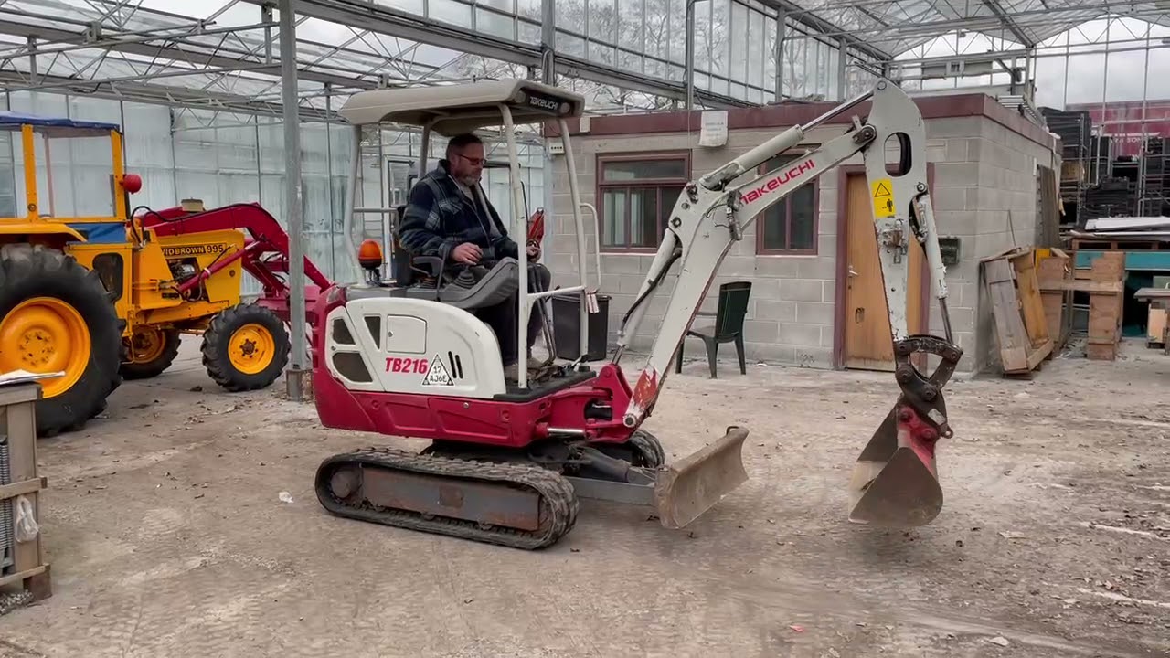 A Takeuchi TB216 mini digger for sale at Ashley Waller Auctions on Tuesday 13th April 2021 - lot 203