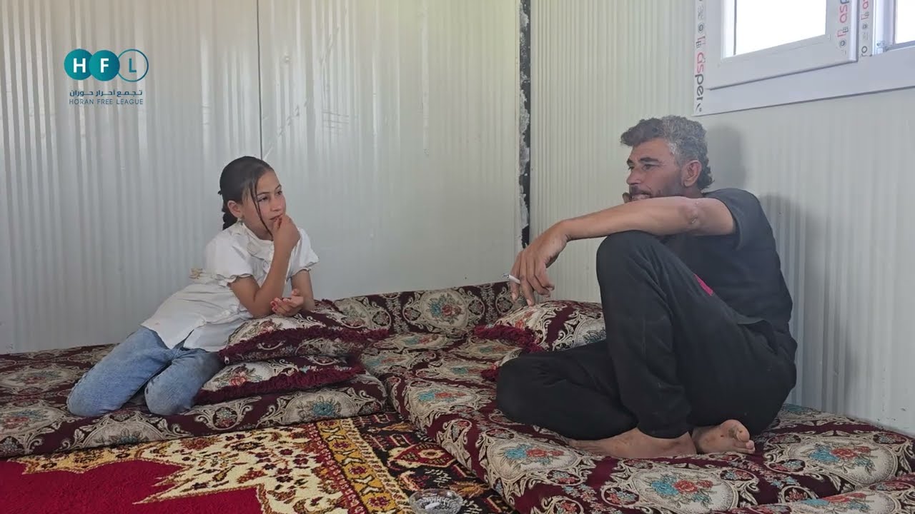 بعد العودة من اللجوء، عائلة من درعا تعيش في كرفان بلا ماء ولا كهرباء