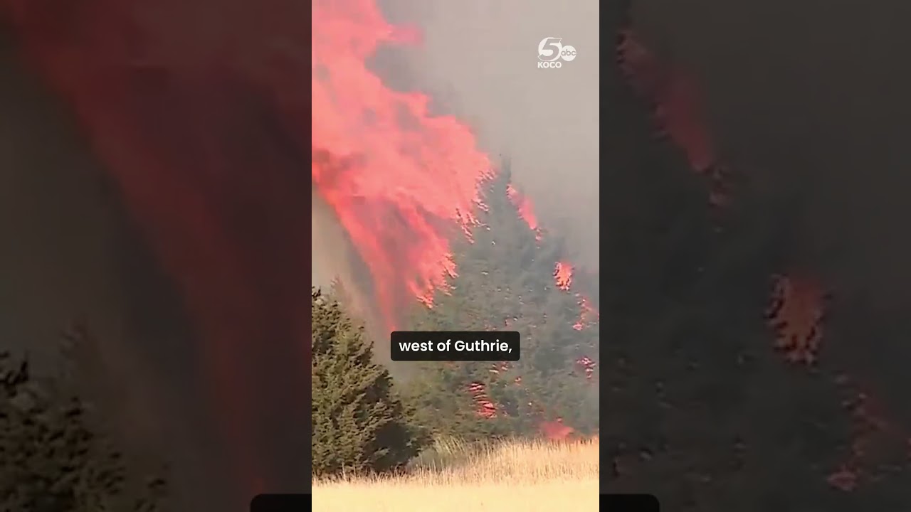 Firefighters battle wildfire south of Cedar Valley, causing heavy smoke to fill sky