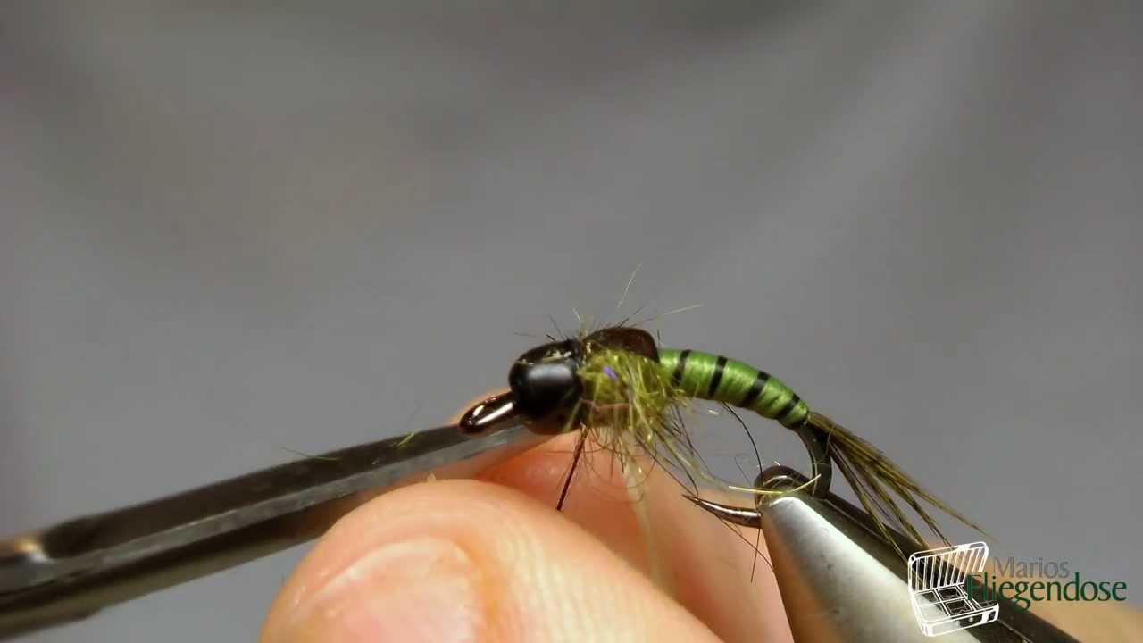 Marios Fliegendose bindet eine Olive Nymphe