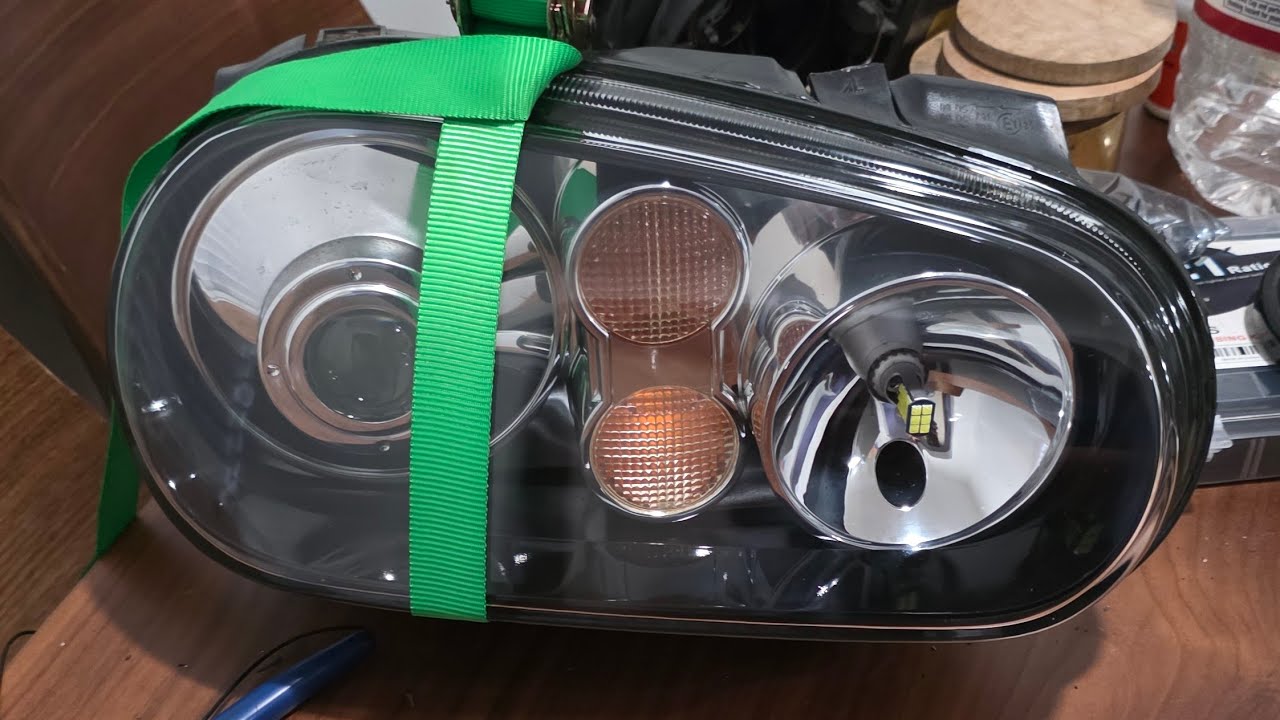 Changing headlight lenses and headlight wiring on Lark the Vw mk4 GTi