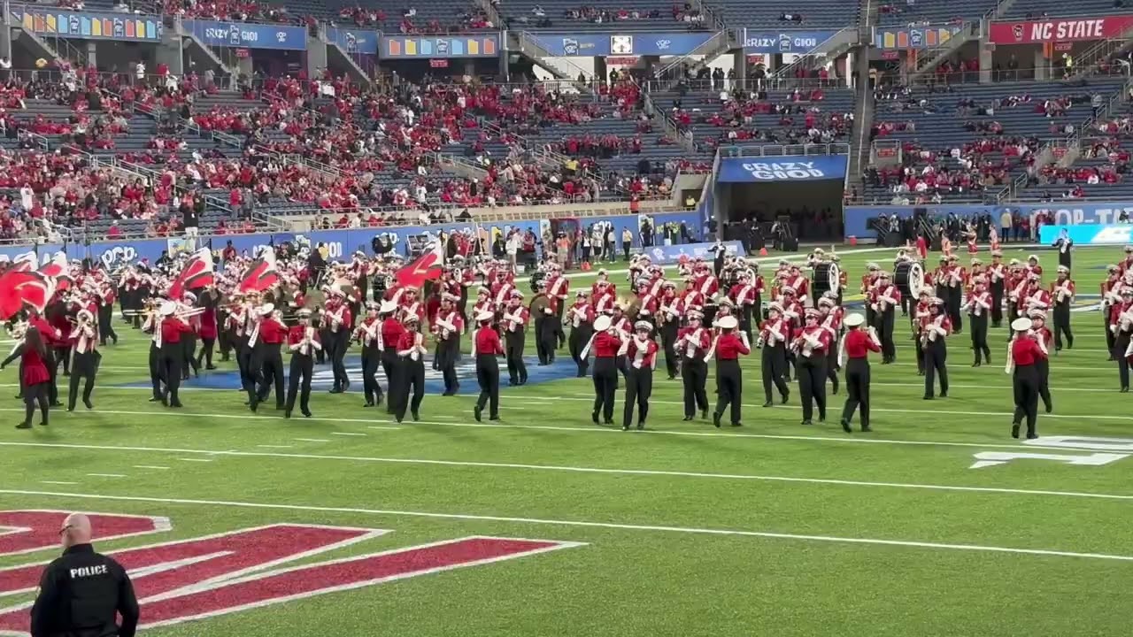 The NC State University Marching Band perform their pregame.