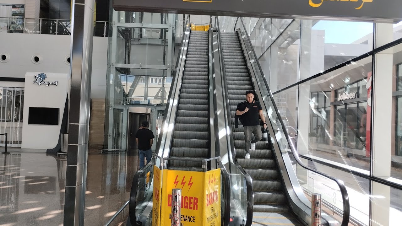 Brunei International Airport - 2013 Schindler 9300AE Escalator and 5400 glass elevator. Inside Area