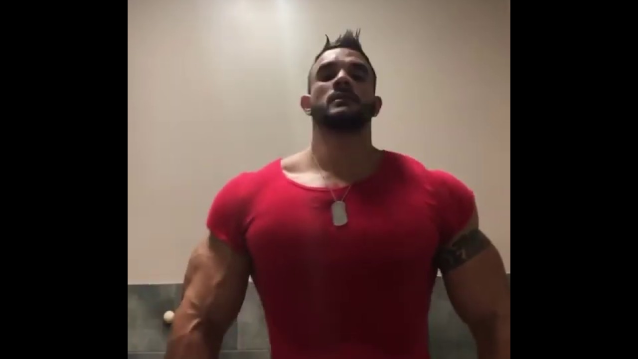 Big muscle man flexing his biceps