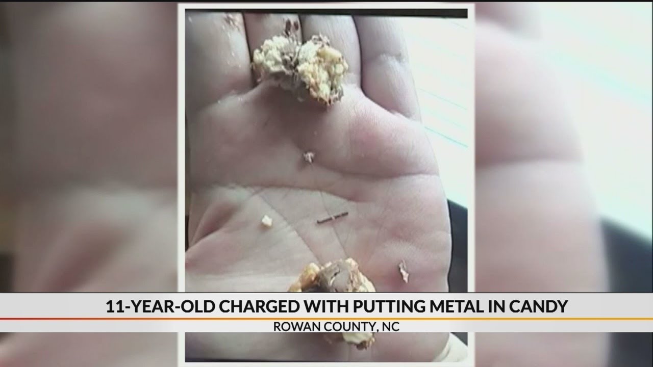 11-year-old charged with putting metal in candy