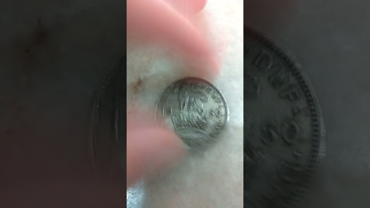 Georgivs vi D : G Br :OMN REX FID DEF 1950 one shilling coin