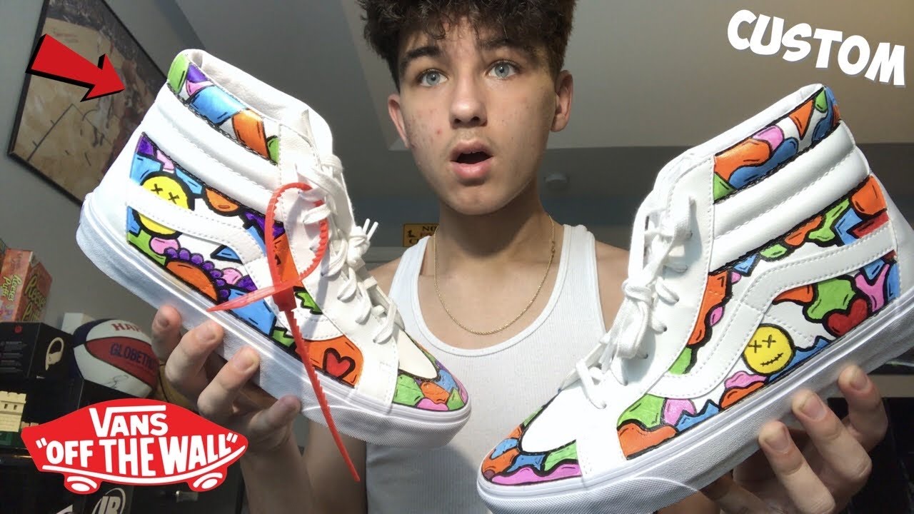 Customizing a pair of white vans with sharpie (satisfying)