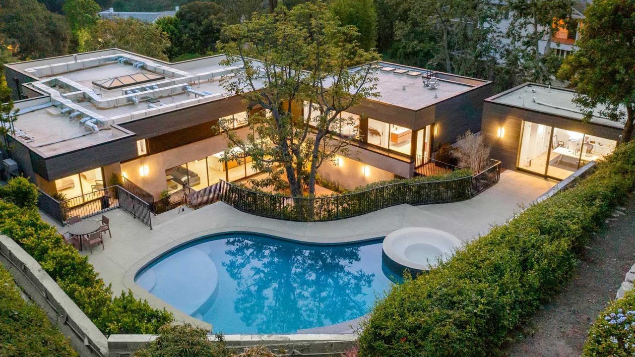 This $12,995,000 Meticulously Remodeled Home in Prime Bel Air Los Angeles has a beautiful backyard