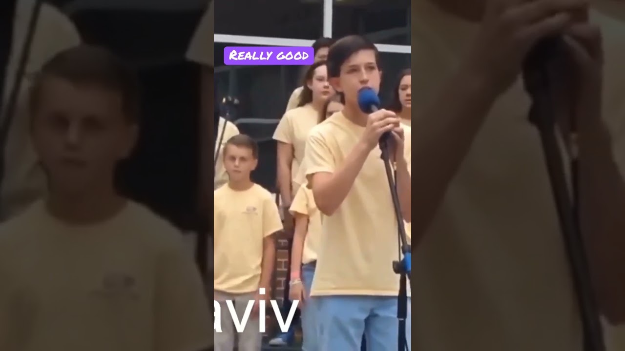 School boy sings riptide