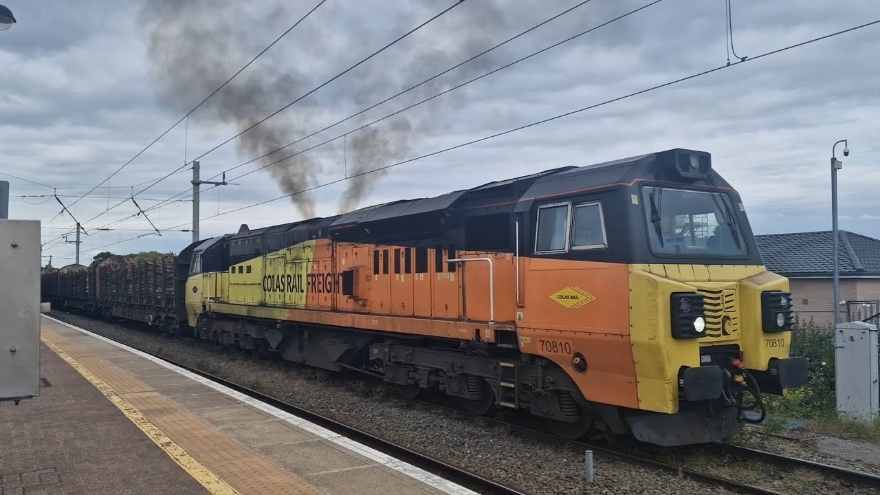 Class 70 810 pulling log train out of Warrington BQ. with tones.