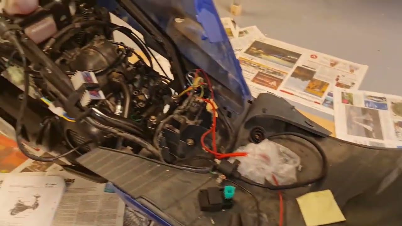 Kymco ZX Series #4  Still Electric and Spark Plug Problems