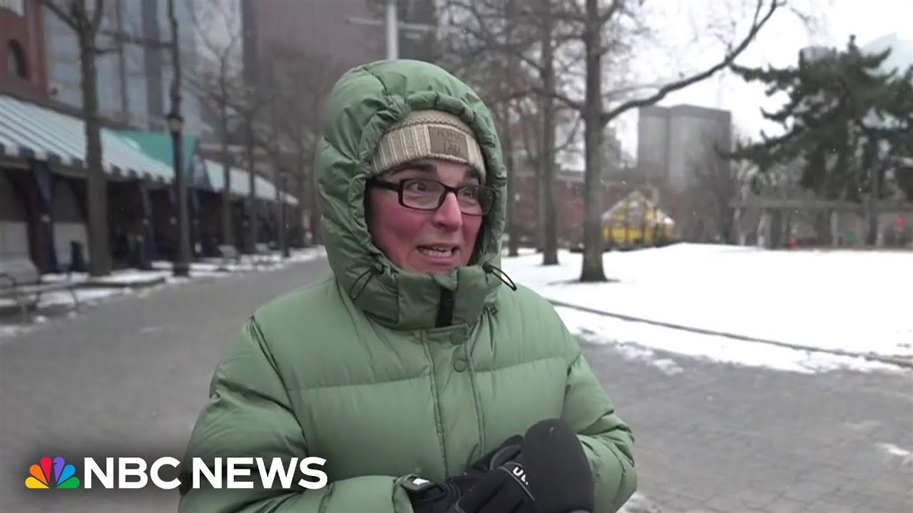 Boston residents plan to ‘hunker down’ as snow continues to fall
