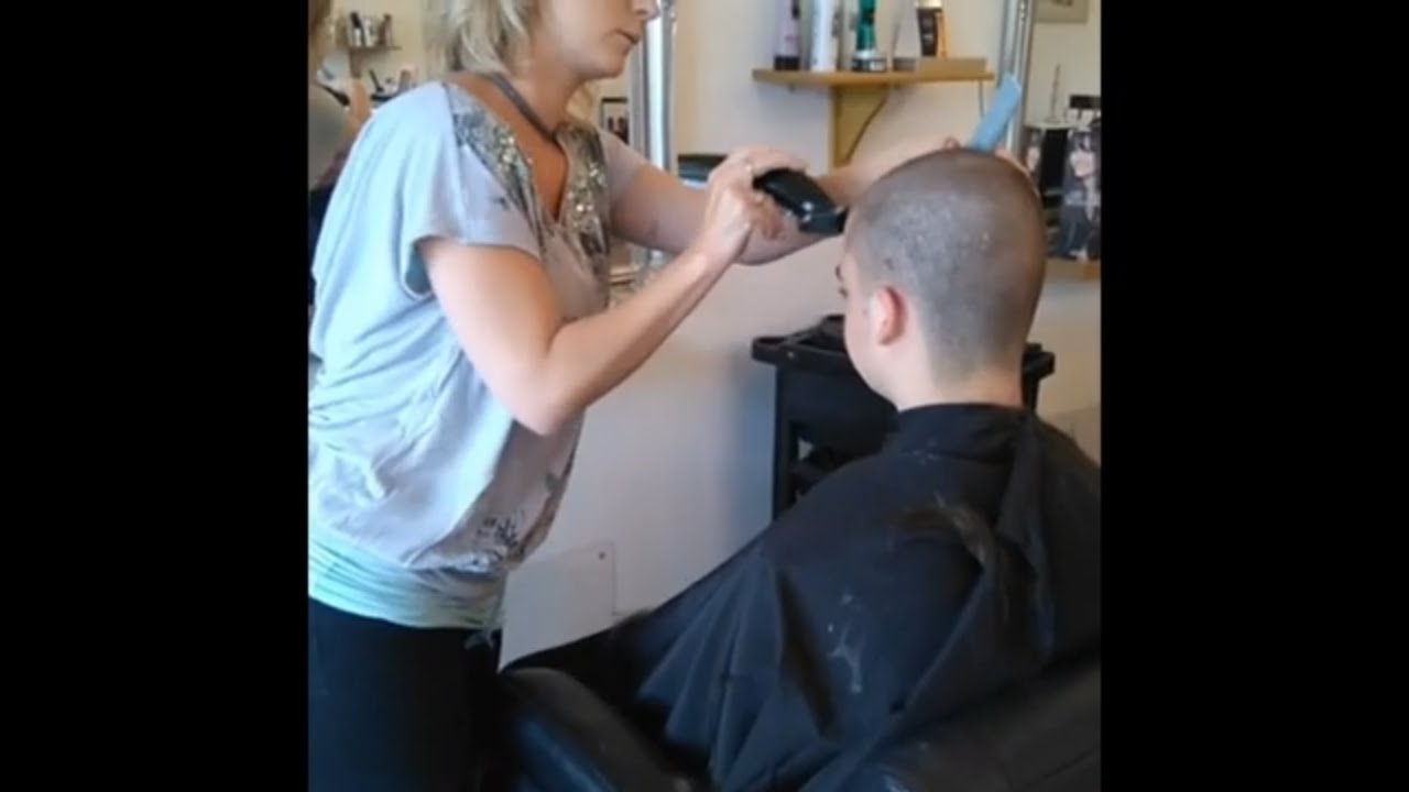 Beautiful Blond Female Hairdresser Shaves Jason's Head