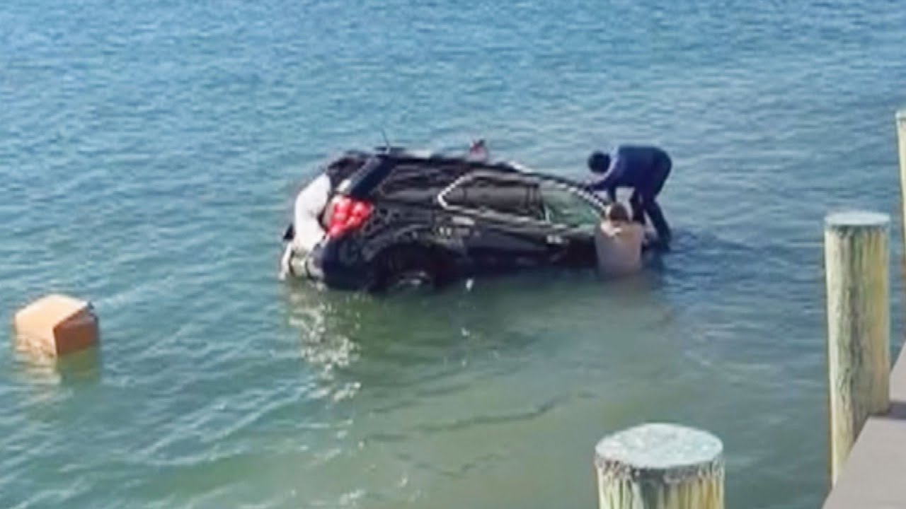 Navy Rescue Swimmer Saves Woman In Sinking SUV