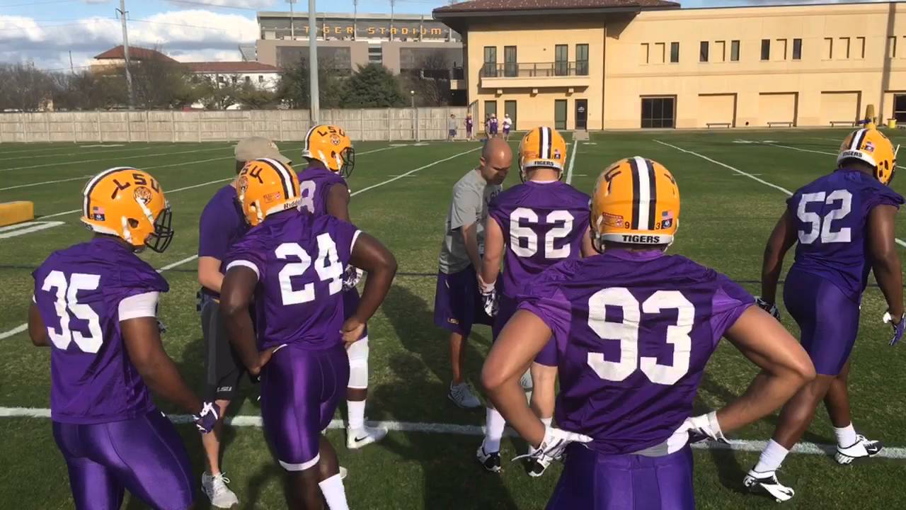 New LSU defensive coordinator Dave Aranda teaching a ball strip drill