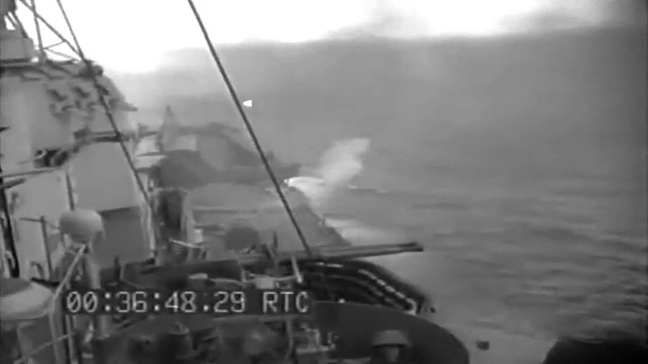 Bombardment Of Saipan: Shell Splashes From Near Misses; Men Pass Empty Ammo Cases, 06/16/1944 (full)