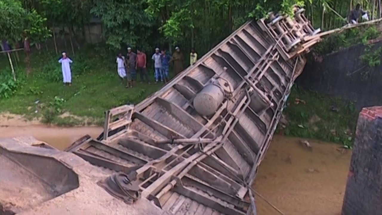 Bridge collapse sends Bangladesh train plunging | AFP