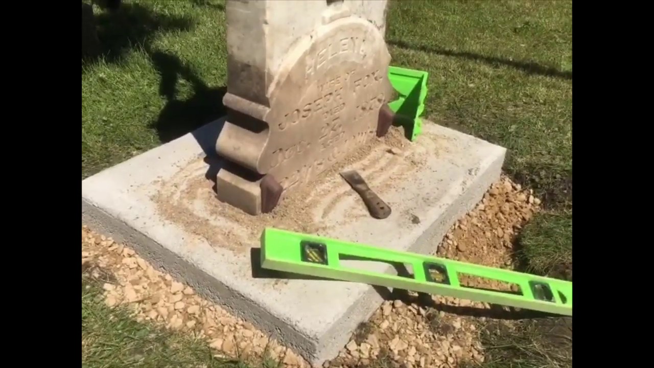 Resetting a marble headstone for FOX in St Mary's of Waseca