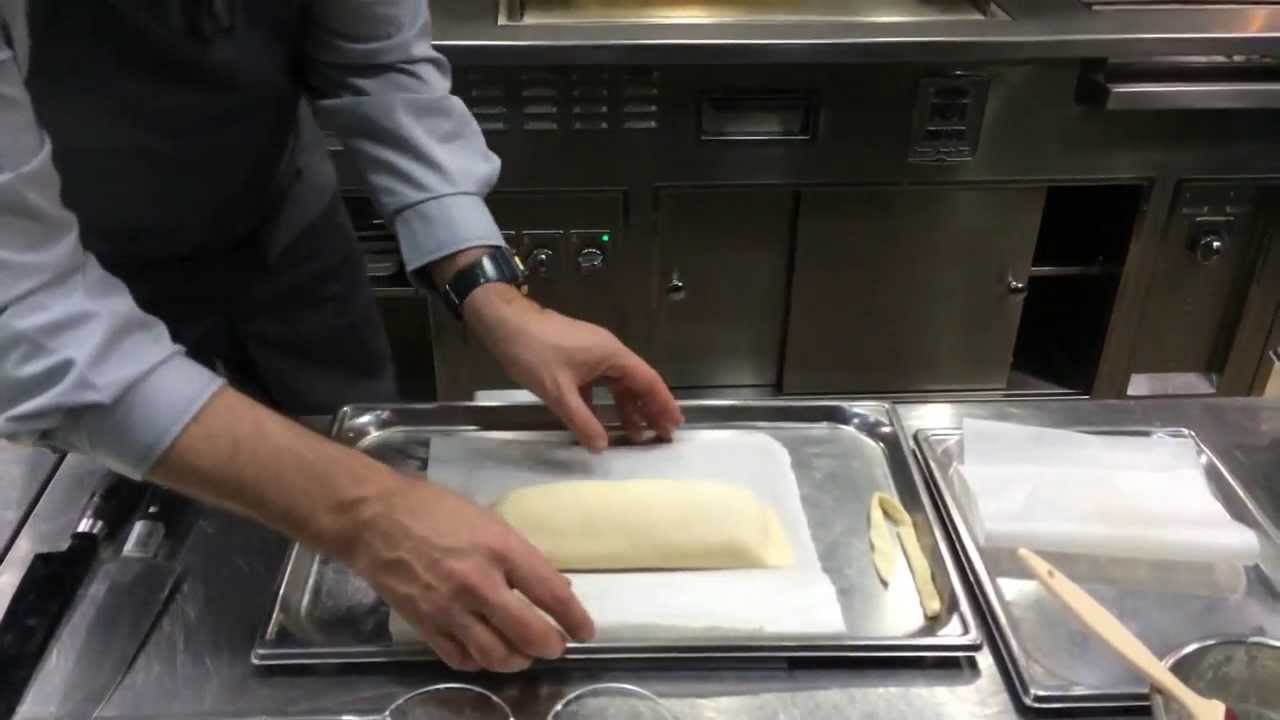 Pairet prepares a sea bass bread at his Ultraviolet by Paul Pairet in Shanghai