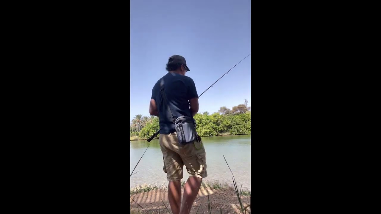Fishing in Yarkon River, Tel Aviv Israel, One of my rare catches.