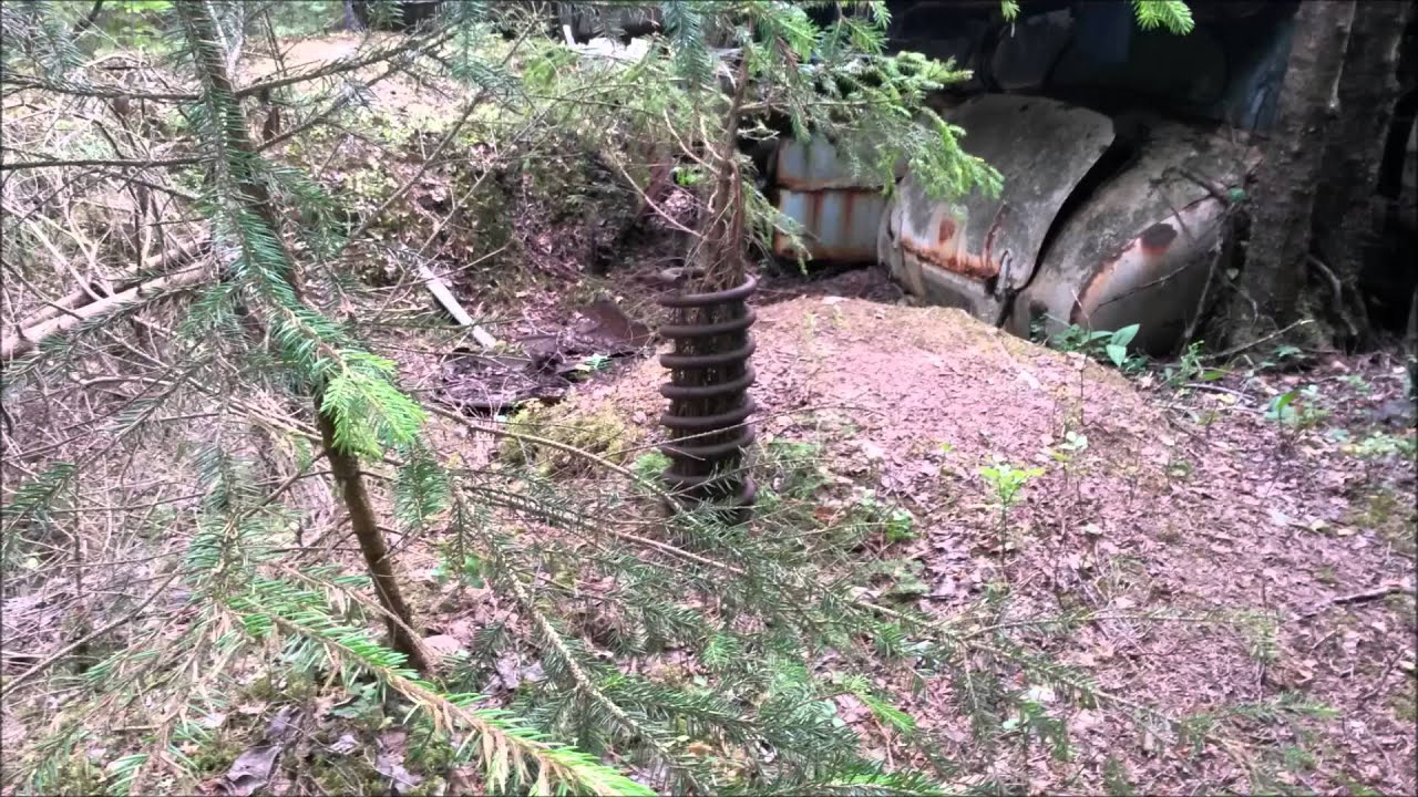 Ivanssons Bilskrot / Bilkyrkogården i Båstnäs 2014-07-15.