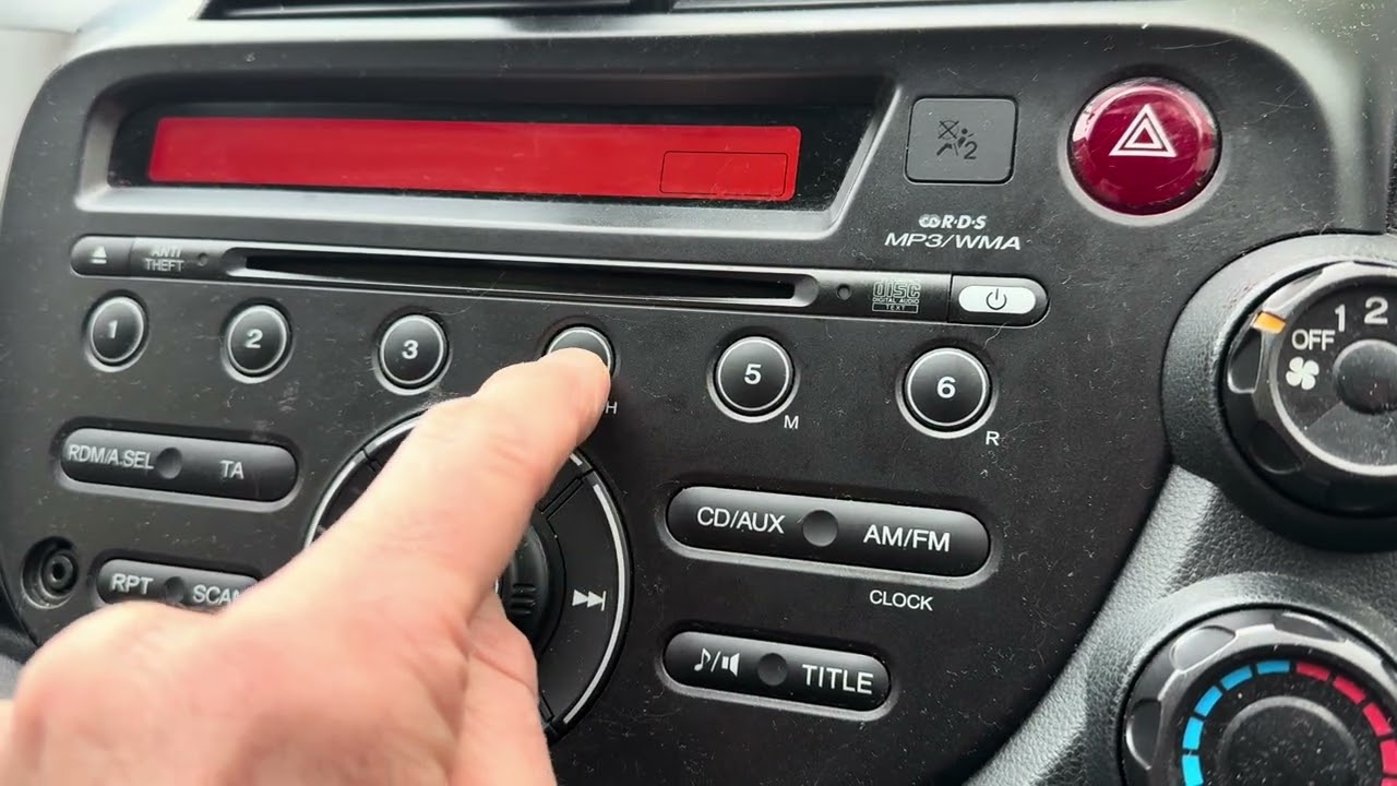 How to set the clock in a Honda Jazz