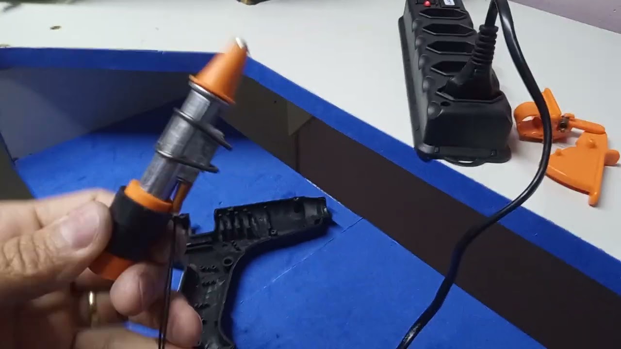 como consertar uma pistola de cola quente
