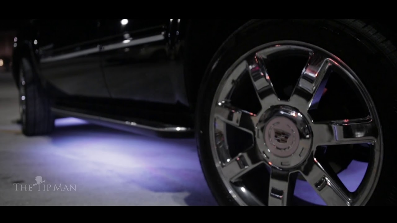 TipMan products displayed on Uber Black Cadillac, & A Lyft LUX Range Rover