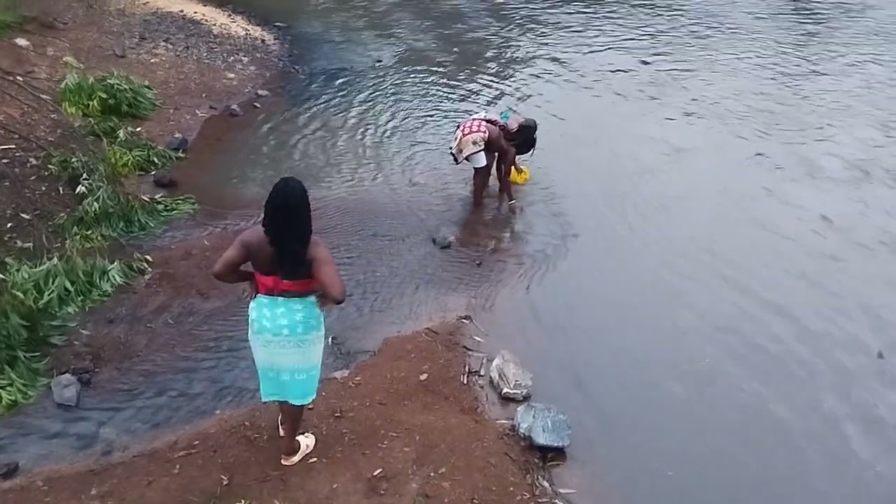 City girl going to fetch water in the village for the first time 