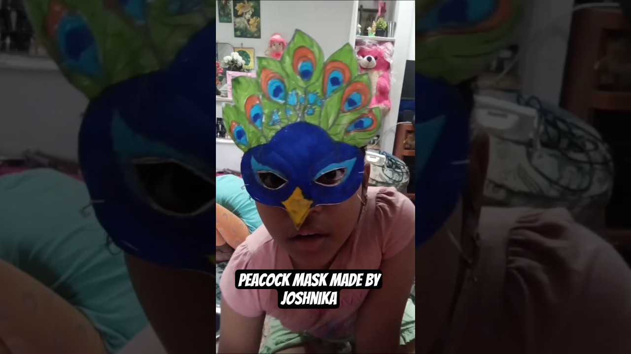 Peacock mask made with cardboard, craft school project