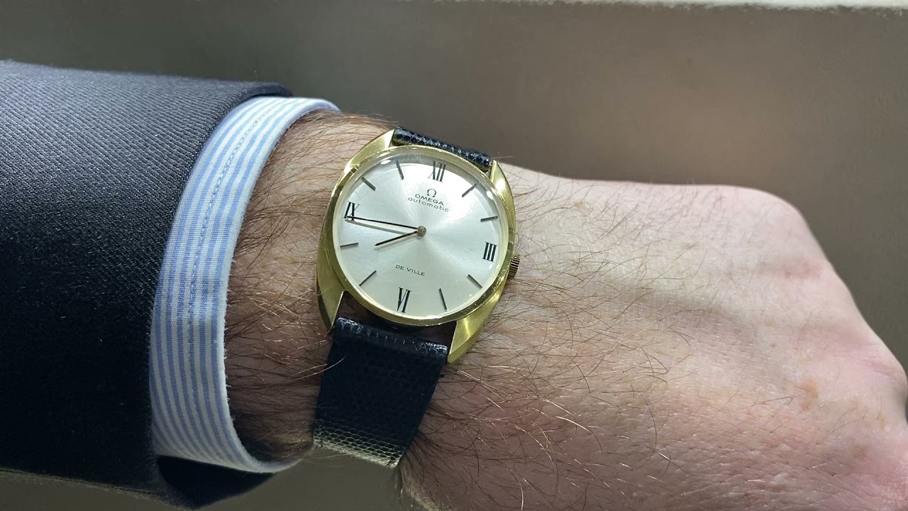 Montre Omega de ville en or jaune 18 Cts vers 1970. Automatique.