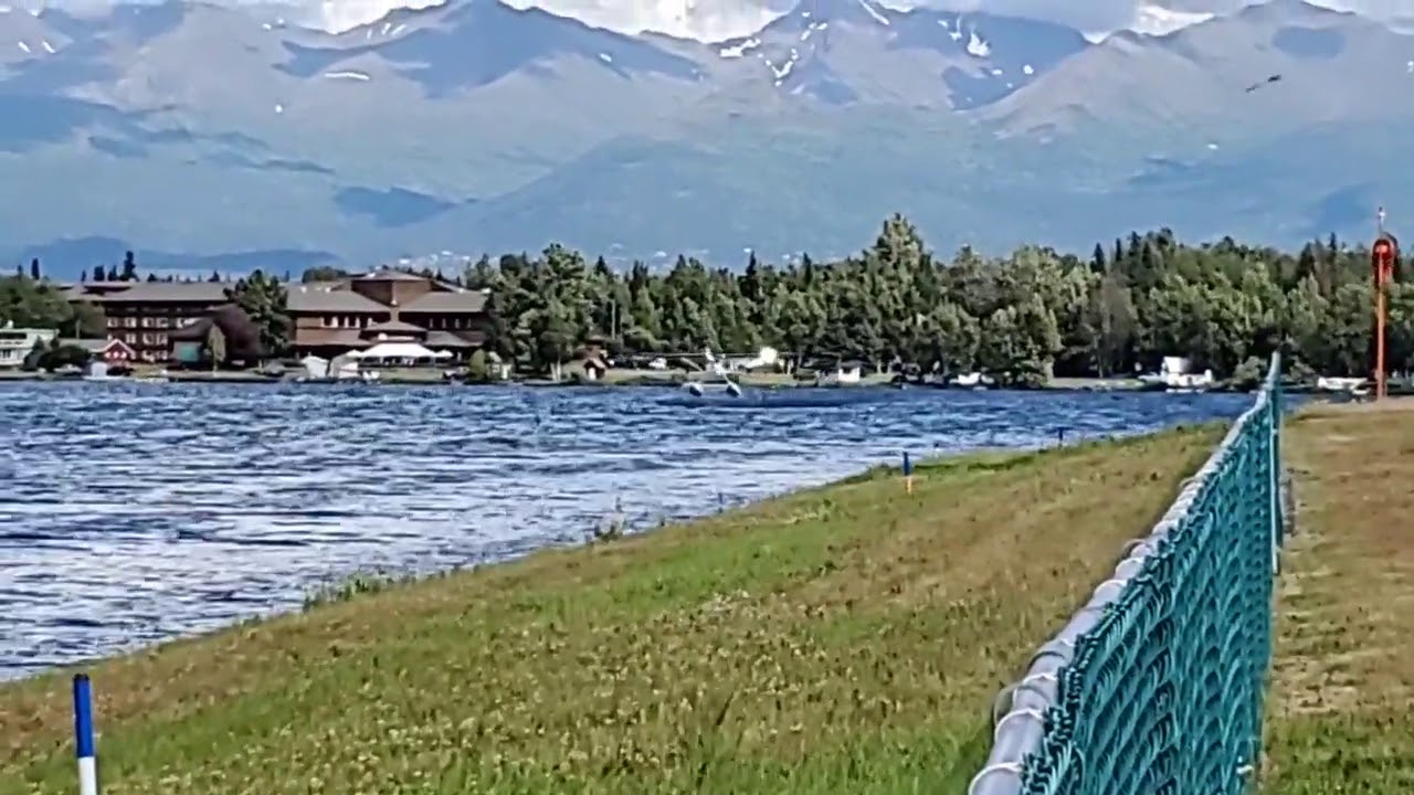 Float plane taking off from Lake Hood Alaska