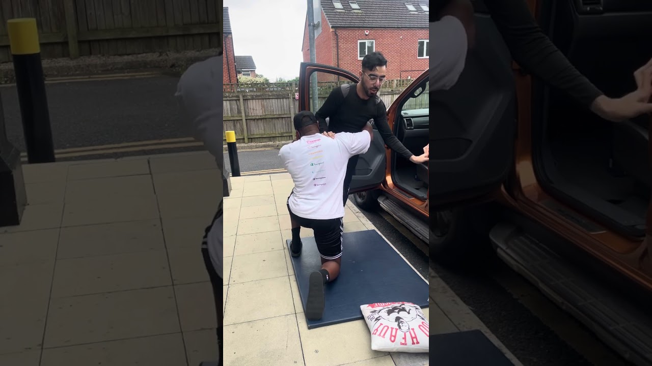Disabled man climbs into a car