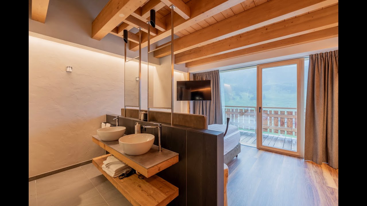 Luxury Spa Suite &ndash; Alpen Resort Livigno | Attico su 2 livelli con vista panoramica e sauna privata