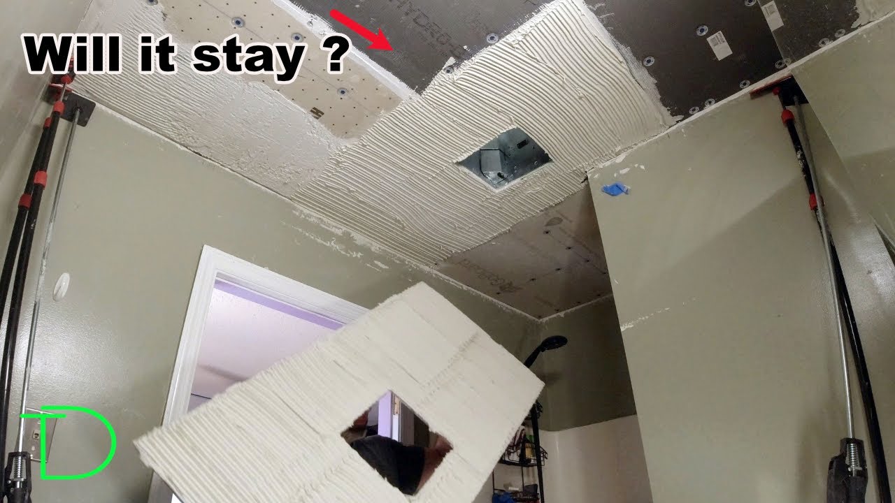 Setting giant tile on a ceiling