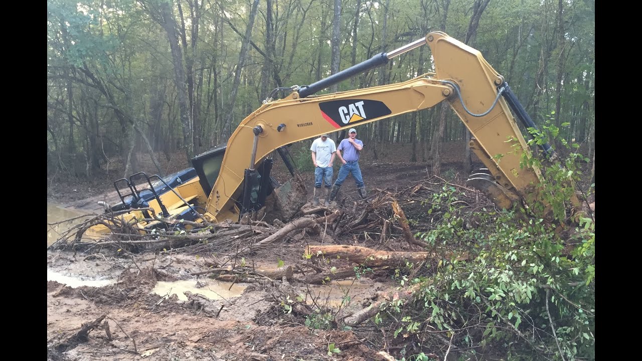 Stuck Trackhoe Excavator Buried Rental Disaster Caterpillar Part 1…