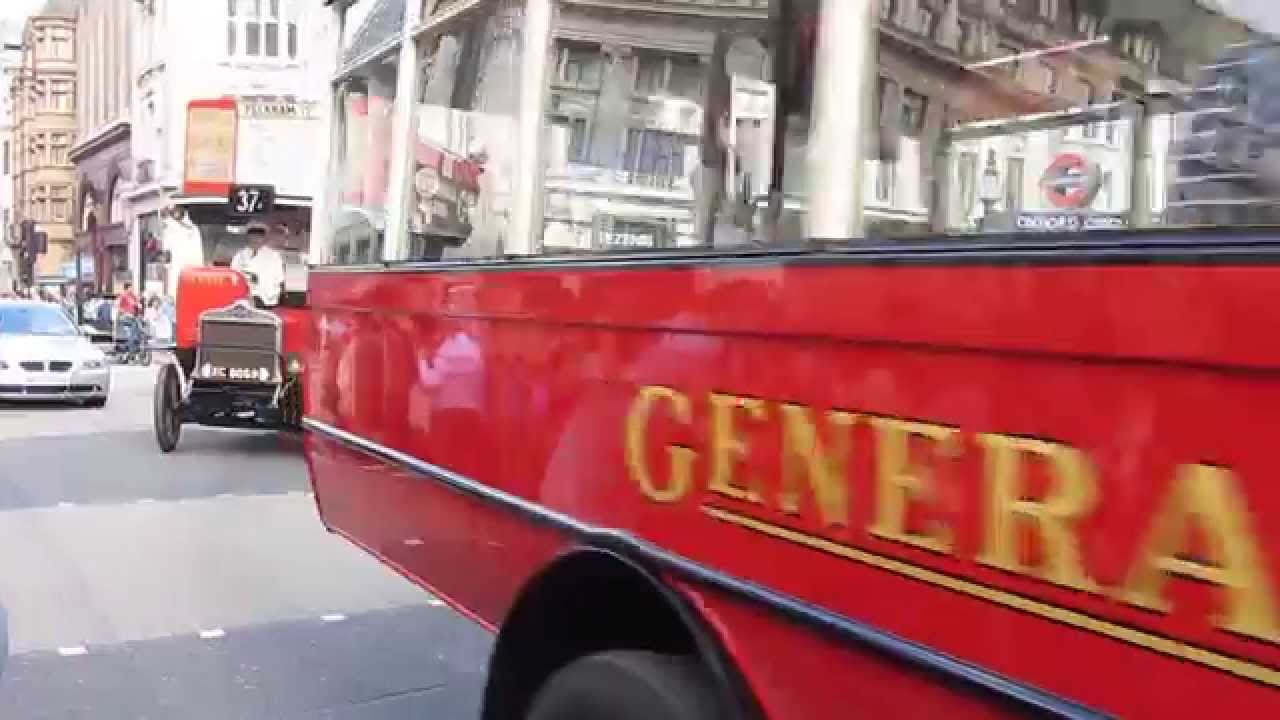 Unique prewar London bus line-up turning into Oxford Street