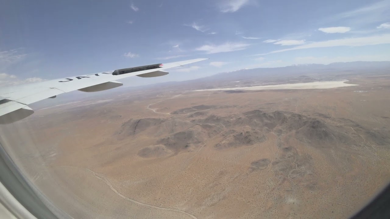 JAL8132(JA701J)  Ferry flight tour to LAX with does low pass over Victorville Airport(VCV).