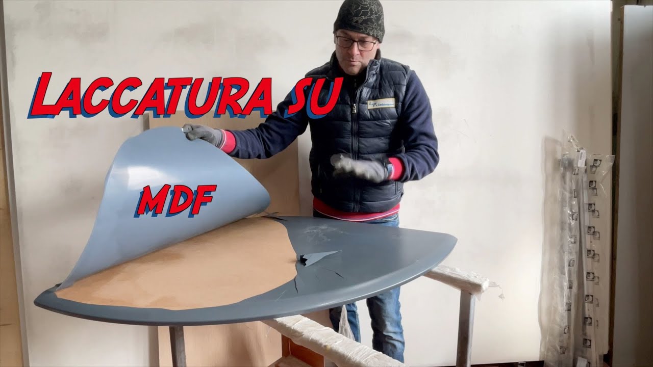 Laccatura su MDF da un pannello spellato postformato.