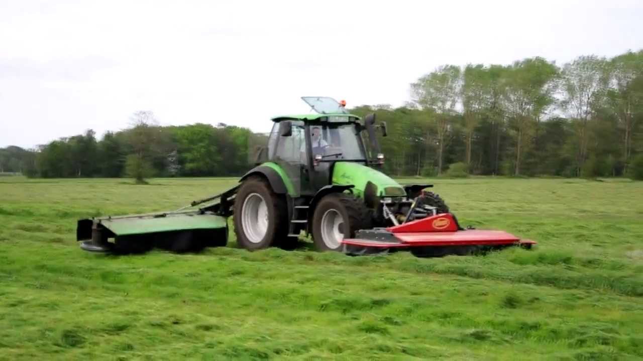 Deutz-Fahr Agrotron 150 Mk3 beim mähen und Deutz-Fahr Agrostar 6.11 beim kehren