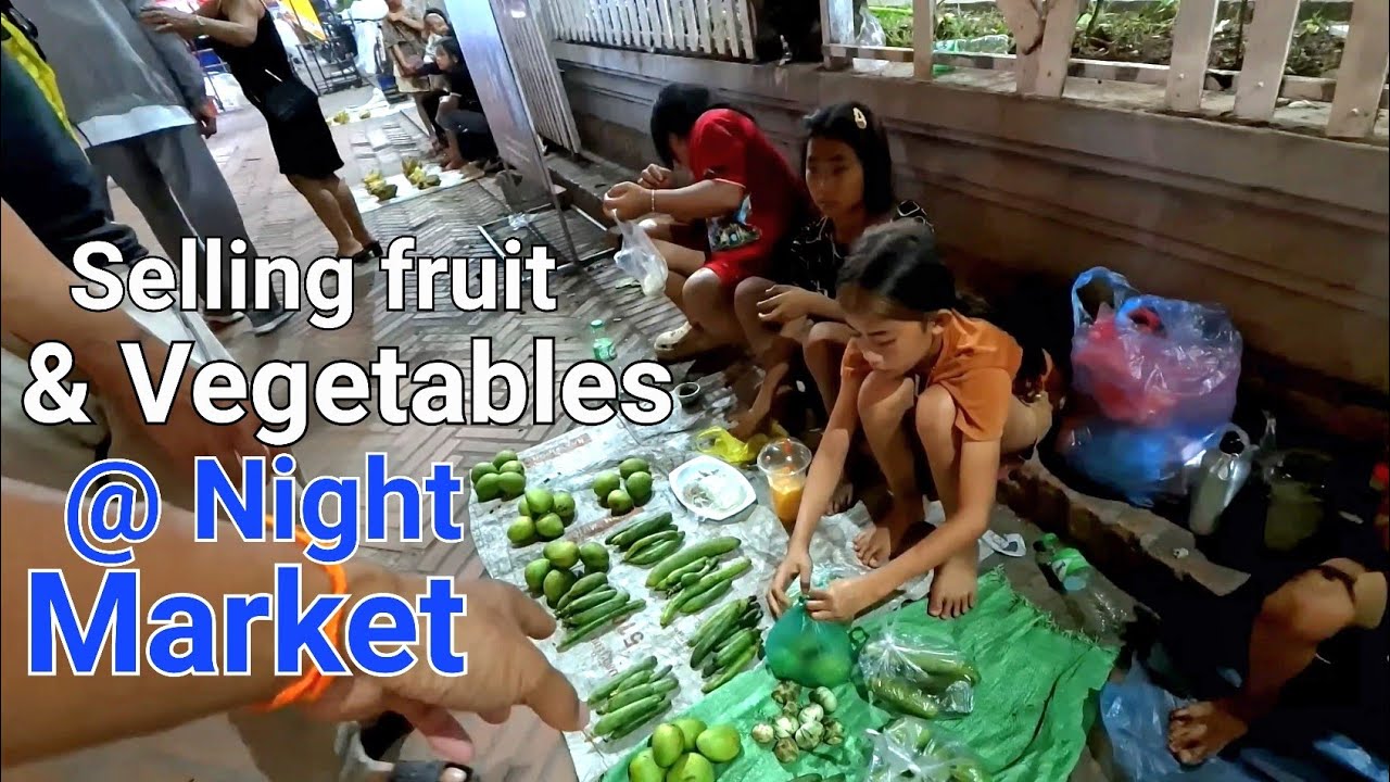Support young kids selling fruit and vegetables from the village in Luang Prabang. LAOS