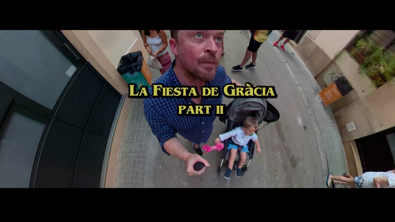 father and son explore surreal barcelona street festival. cool spain travel vlog.